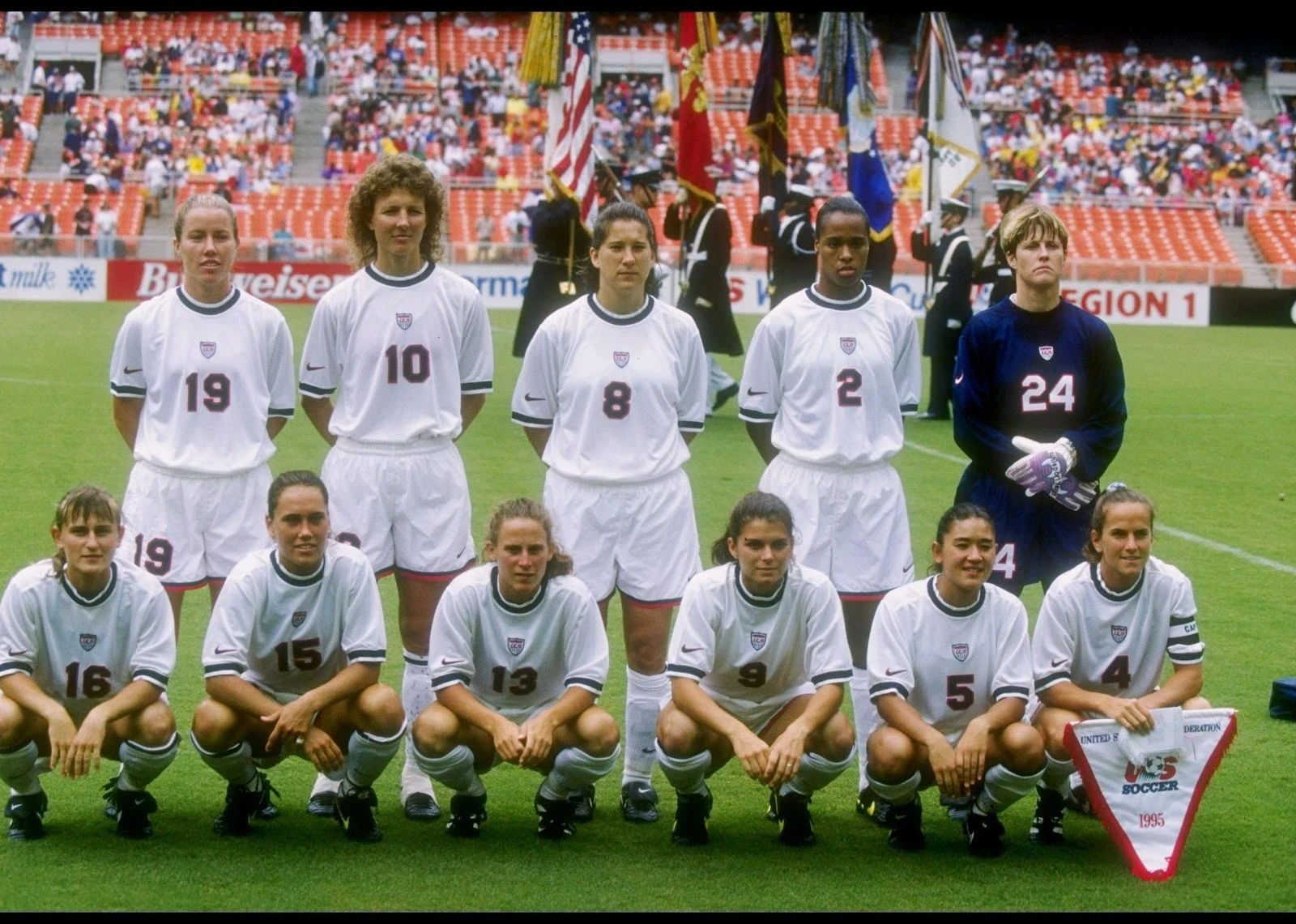 Members of the USA Soccer team pose for a picture.