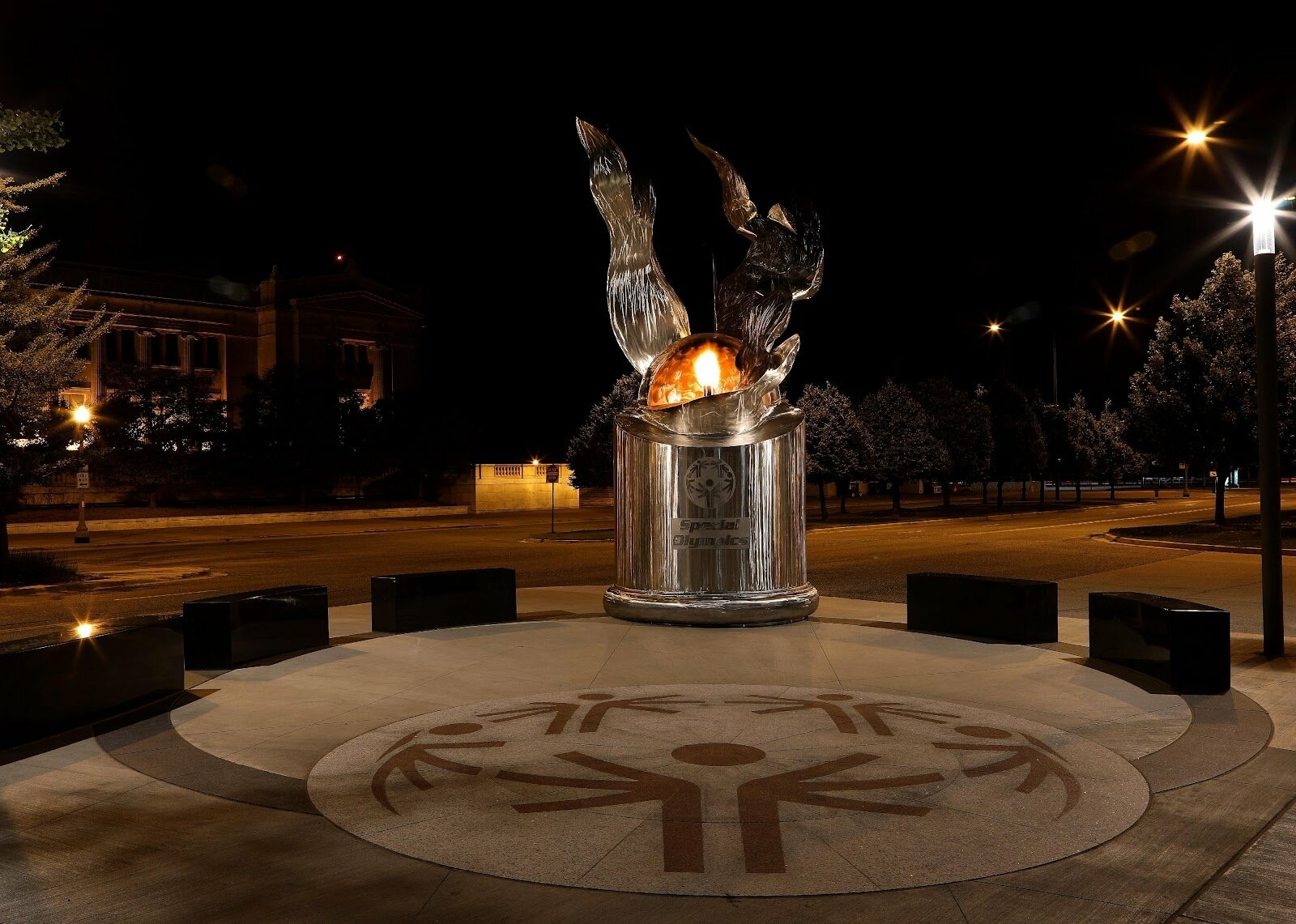 Richard Hunt's The 'Eternal Flame Of Hope,' which symbolizes the Special Olympics' theme of inclusion and unity as well as hope, standing outside Soldier Field in Chicago, Illinois