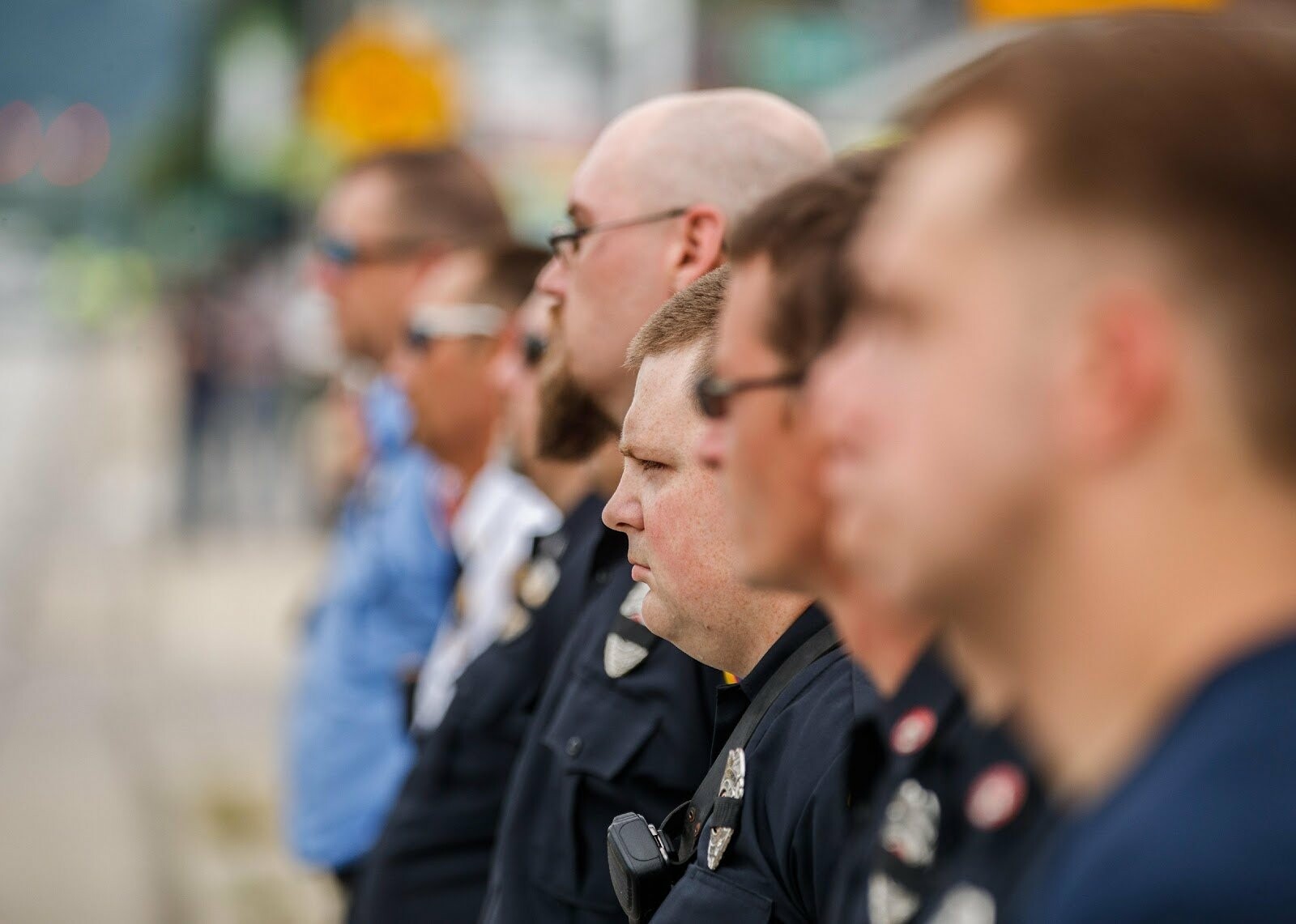 Firefighters lined up on the street in Bloomington, Indiana