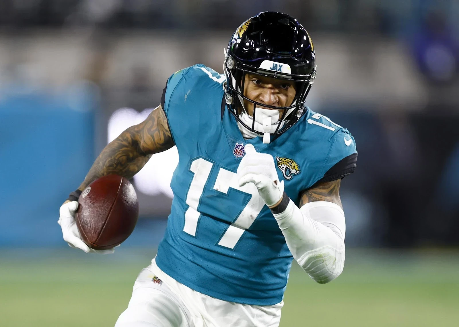 Evan Engram #17 of the Jacksonville Jaguars carries the ball.